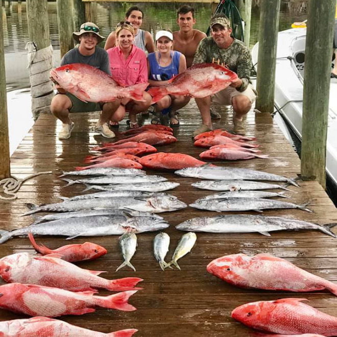 Group of anglers with all their catches