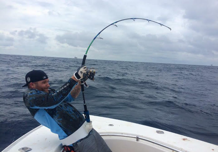 Man reeling in a big fish on Florida's Forgotten Coast